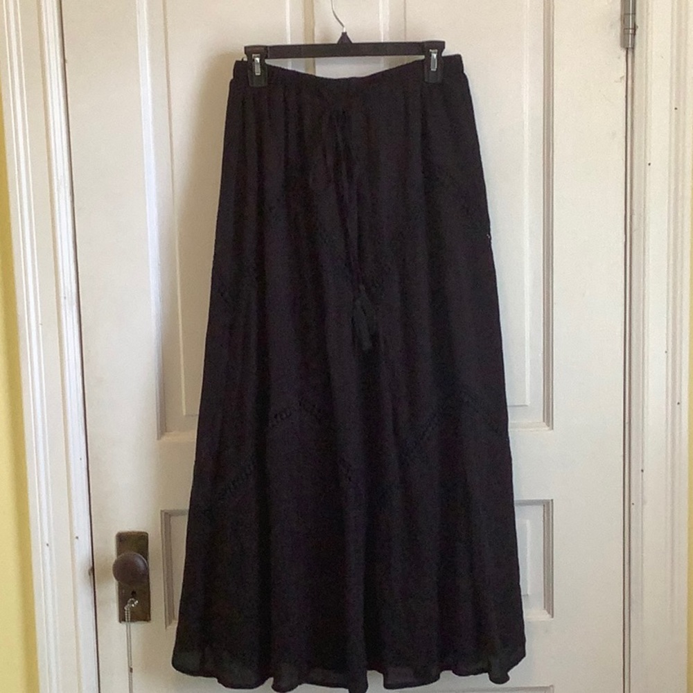 Black “broomstick “ Skirt with crochet inserts.